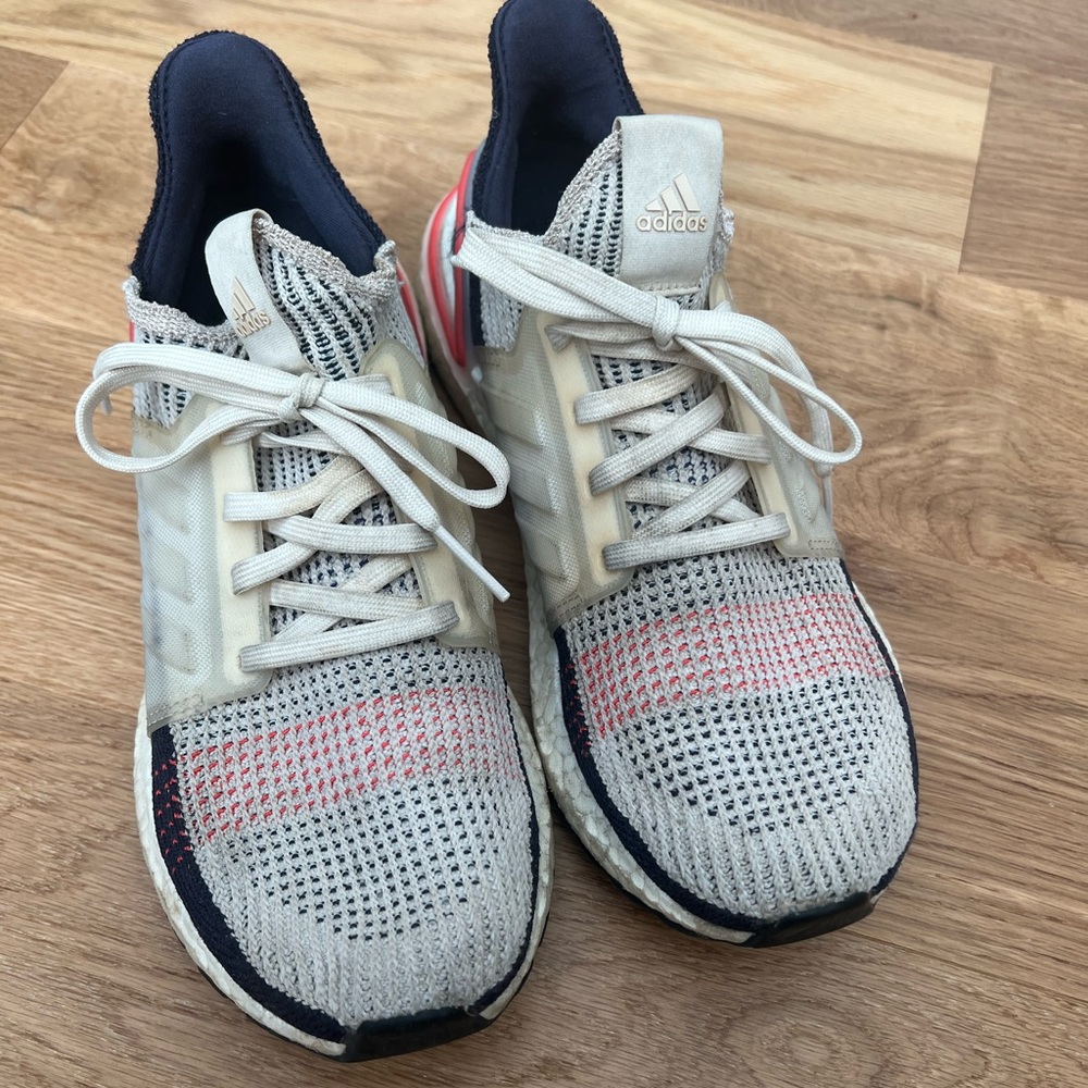 Adidas ultraboost. Lots of life left. Tan, black, and orange in color.